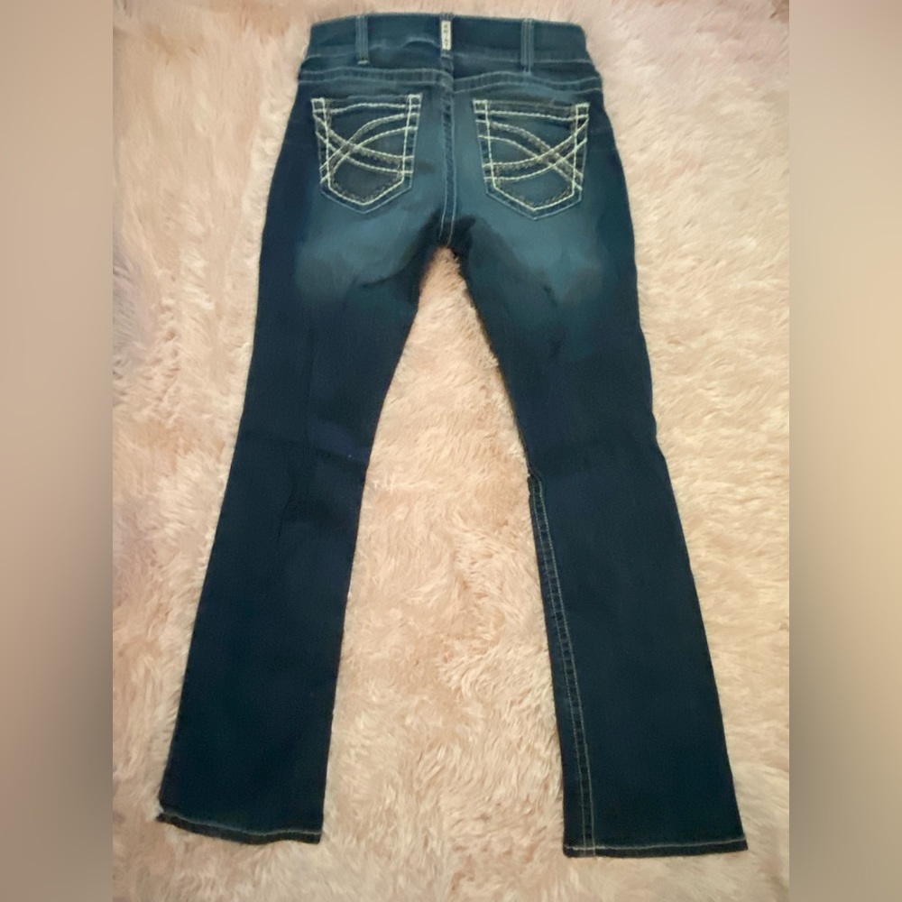 Size 29R Ariat jeans, bootcut style. No tags but only worn to try on.